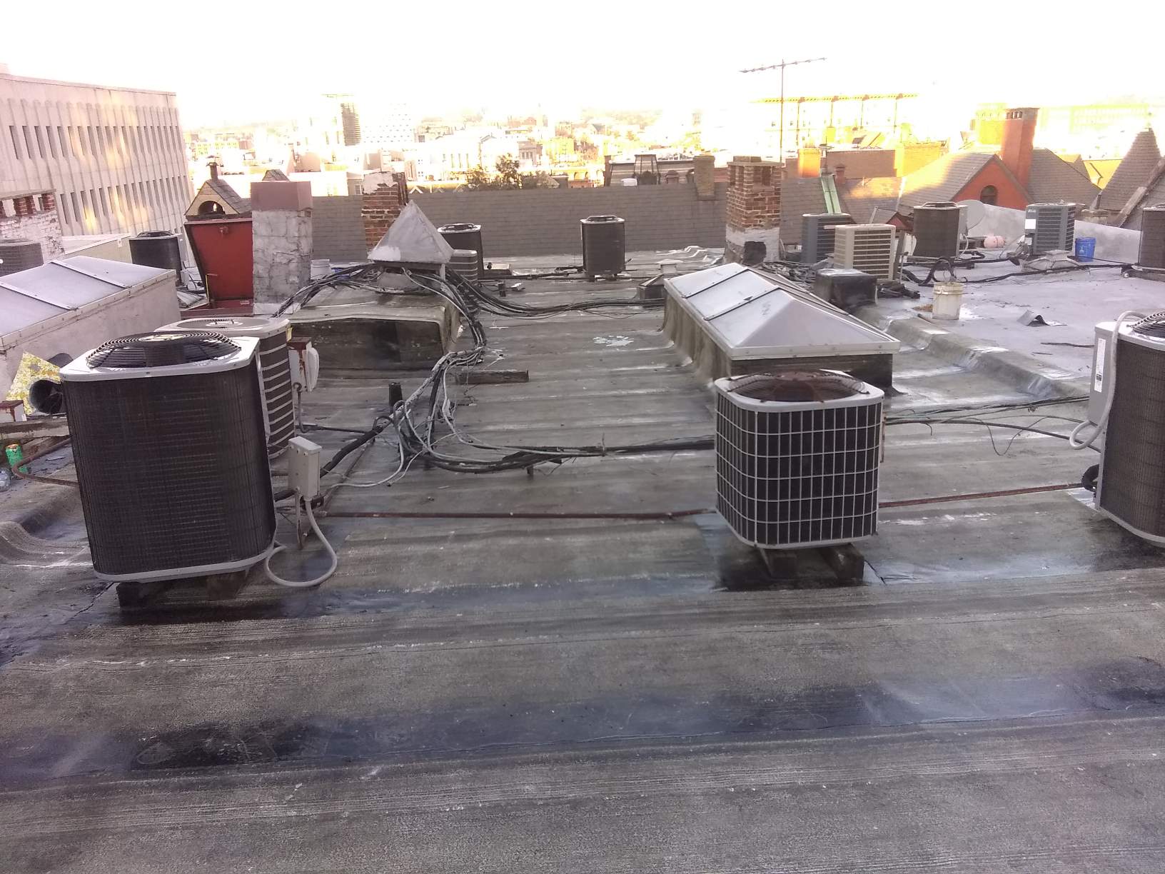 Building rooftop cluttered with equipment