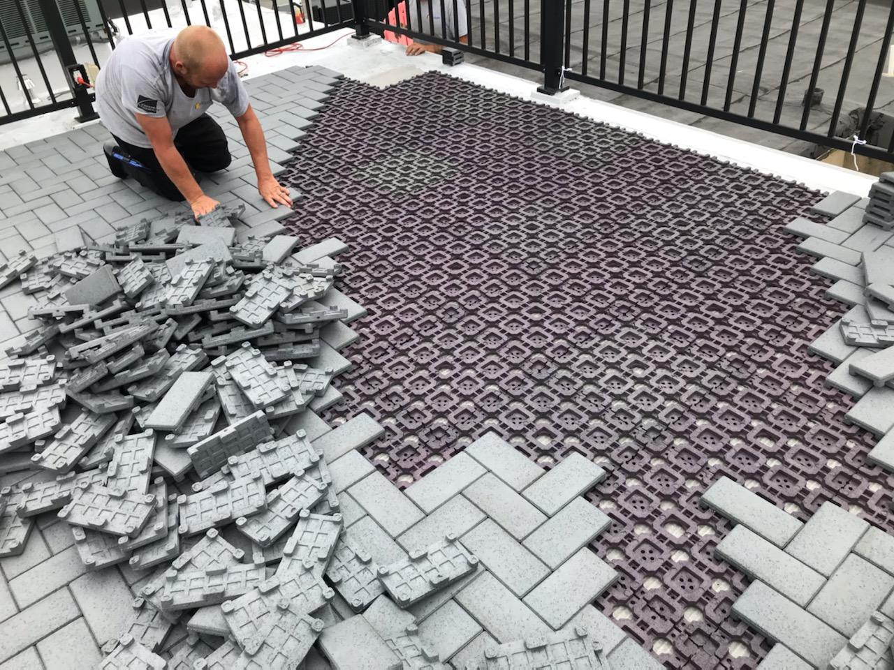 A man working on Tile Roof Repair